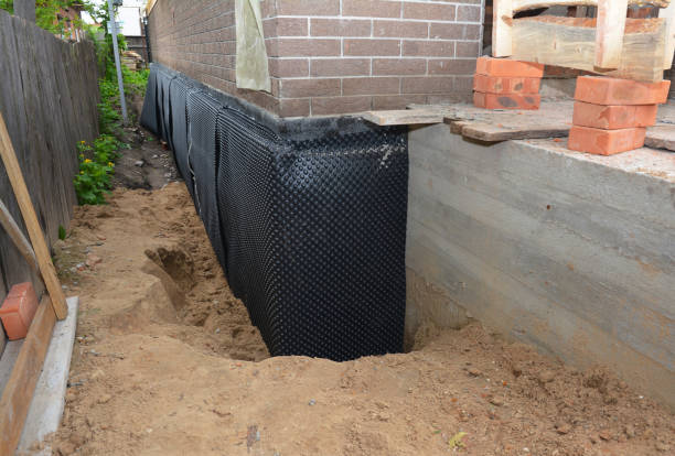 Happy homeowners after waterproofing job in Manitowoc
